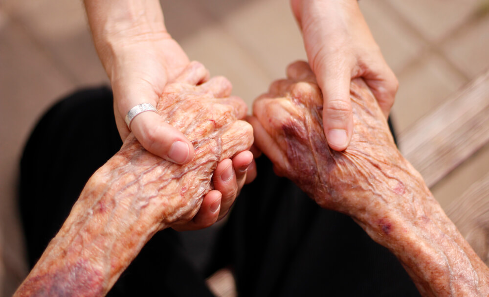 Elderly Lady and Young Girl Holding Hands, Support for the Elderly